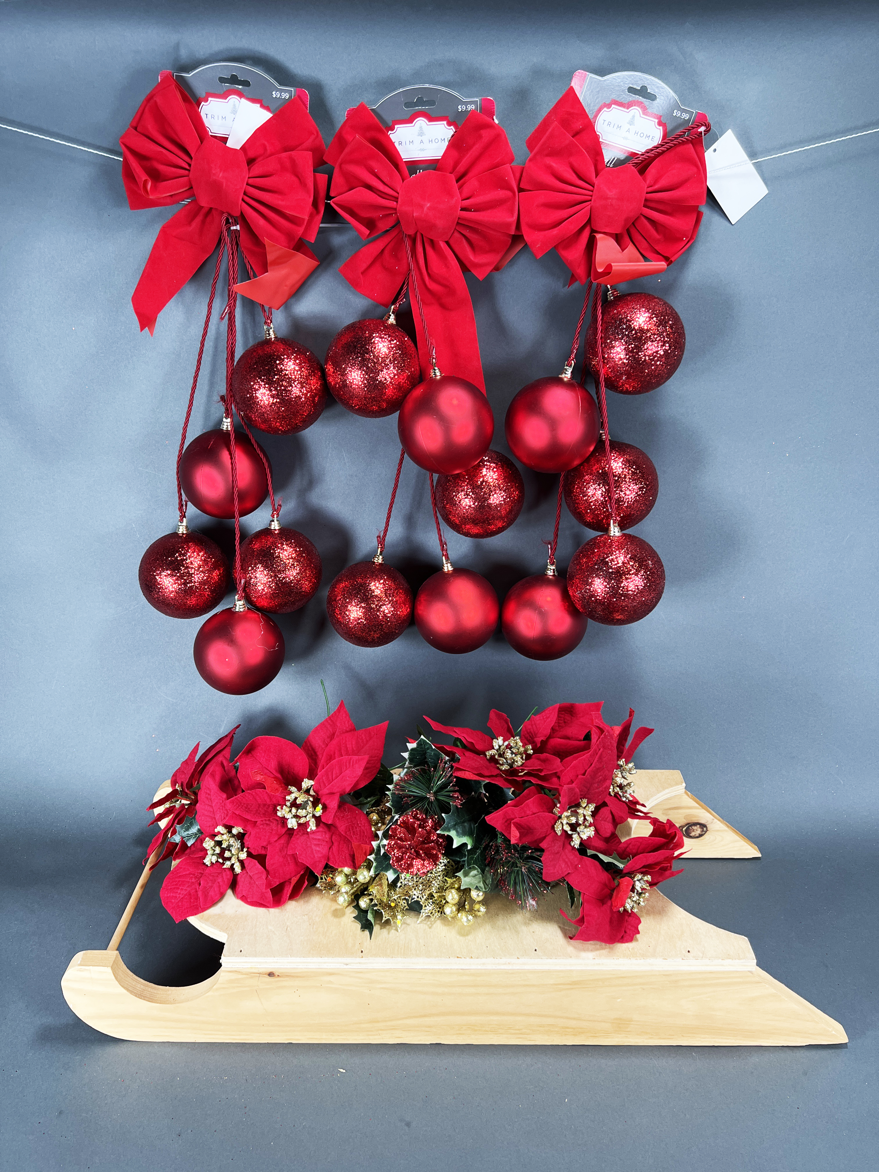 Red Christmas Ornaments And Wooden Sled image 1