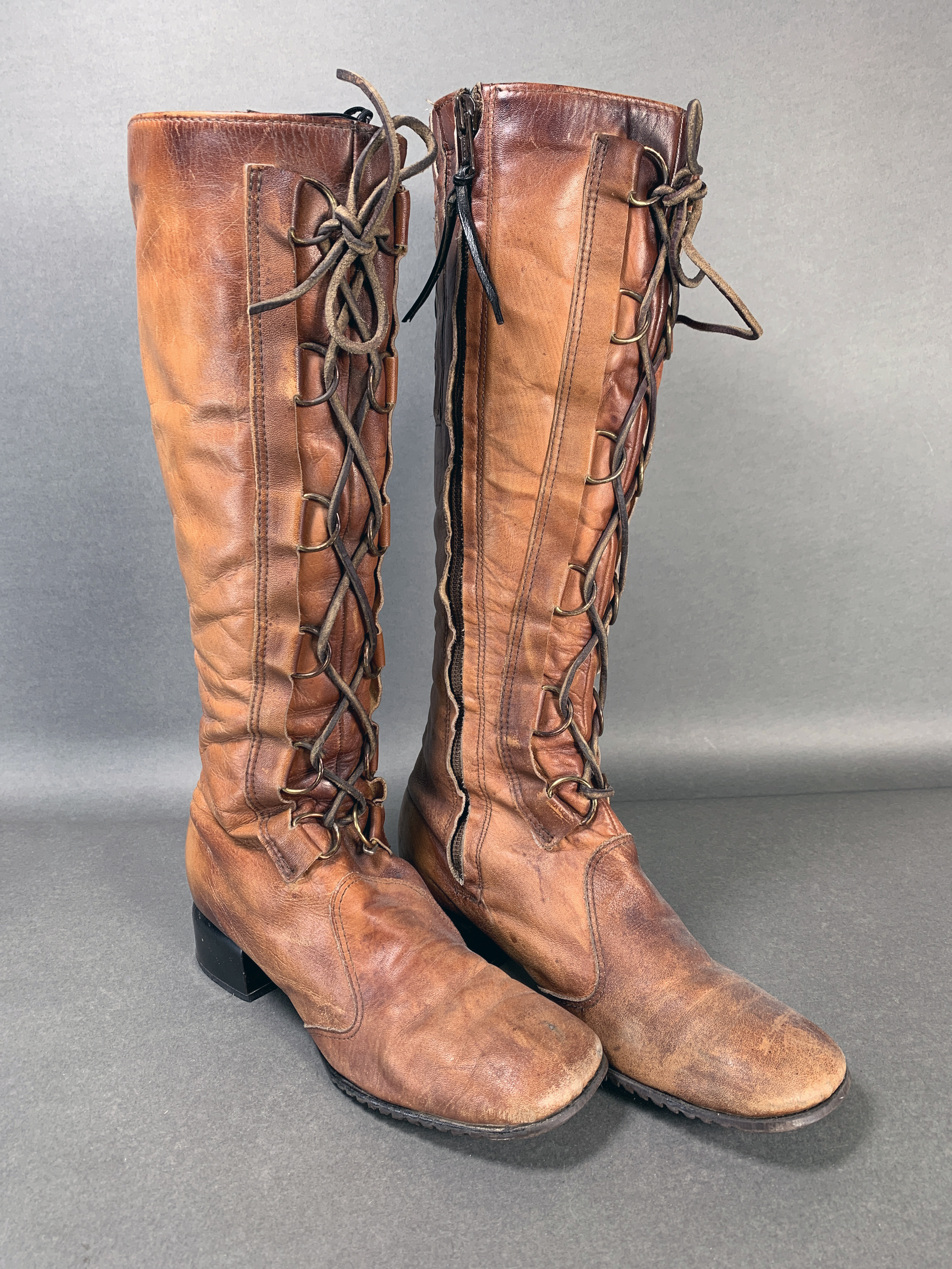 Pair Of Brown Leather Knee High Boots image 1