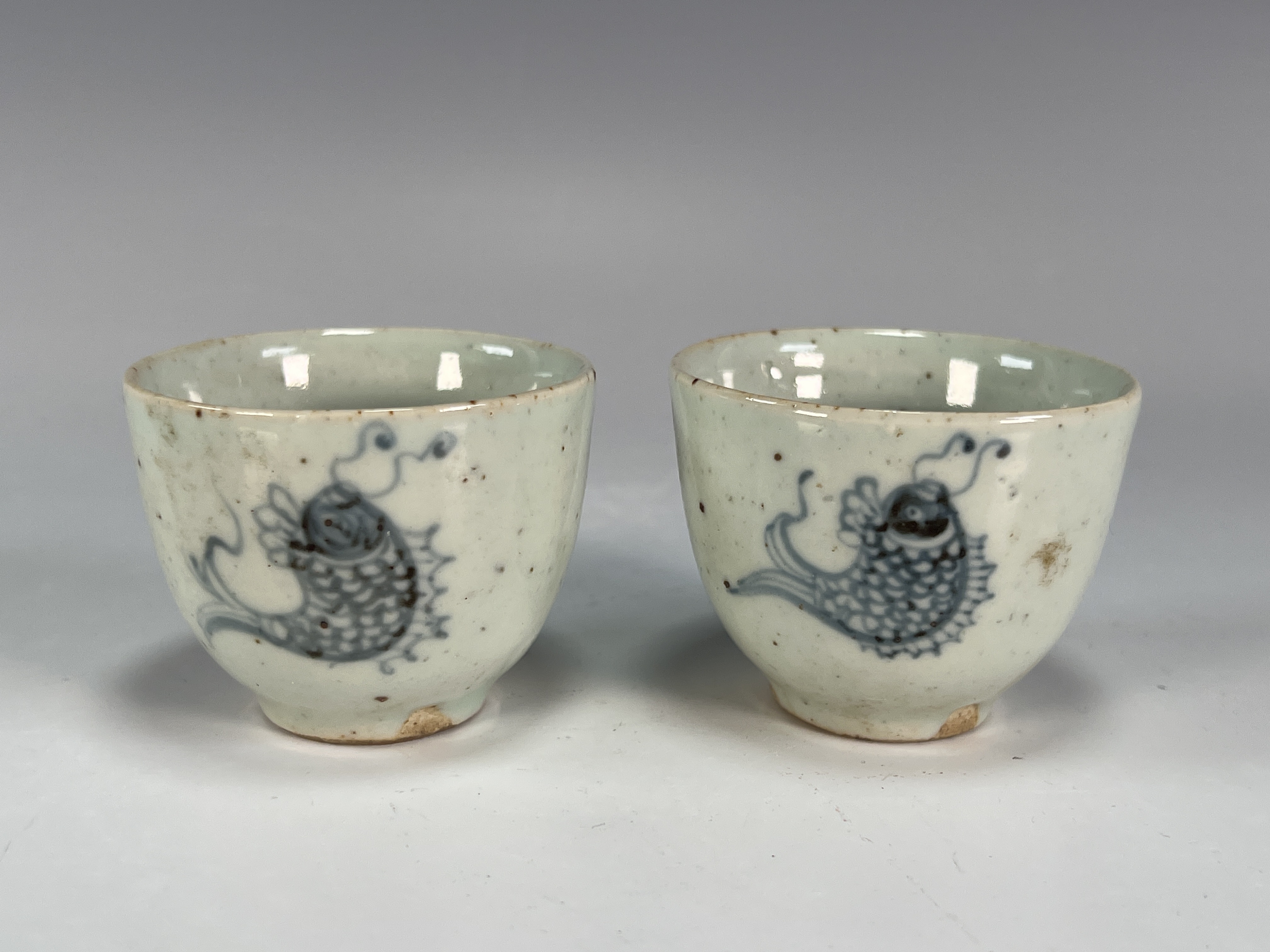 Pair Small Blue & White Fish Tea Cups image 1