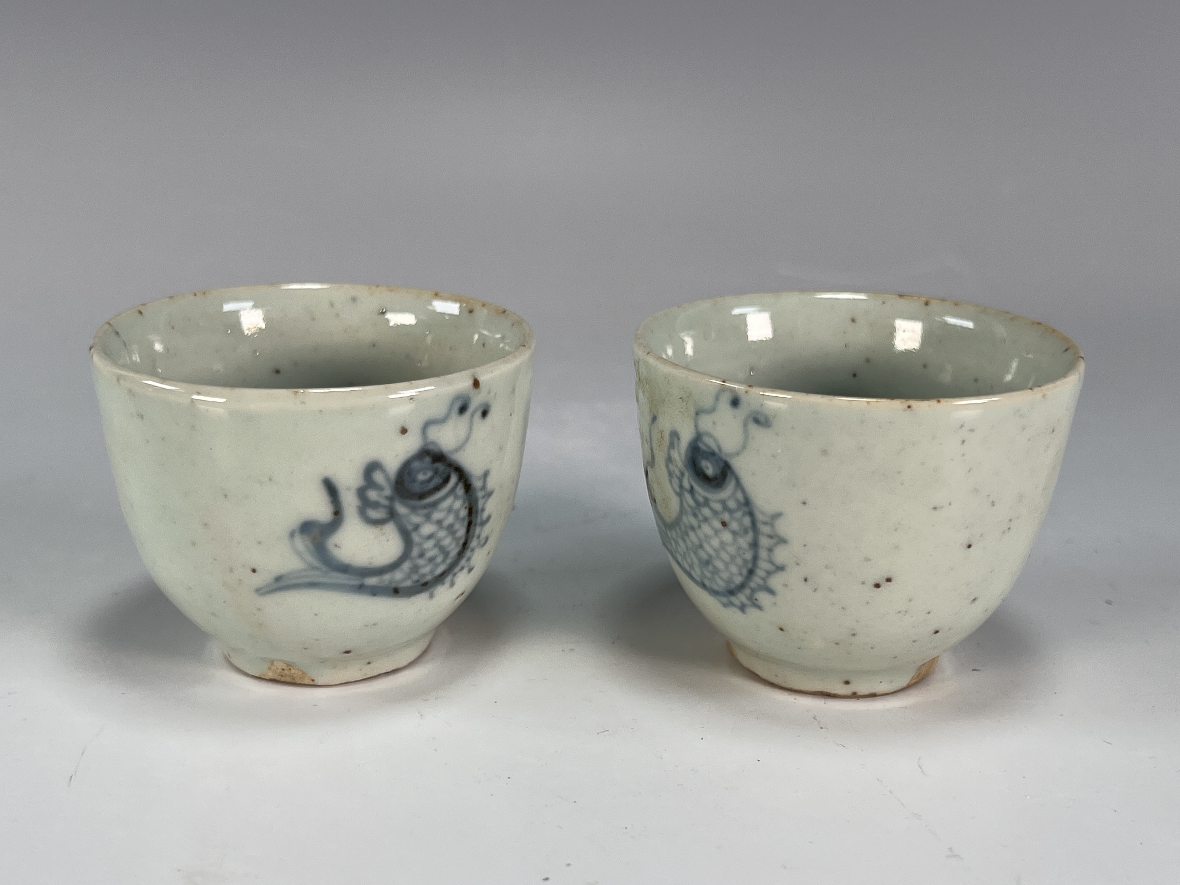 Pair Small Blue & White Fish Tea Cups image 2