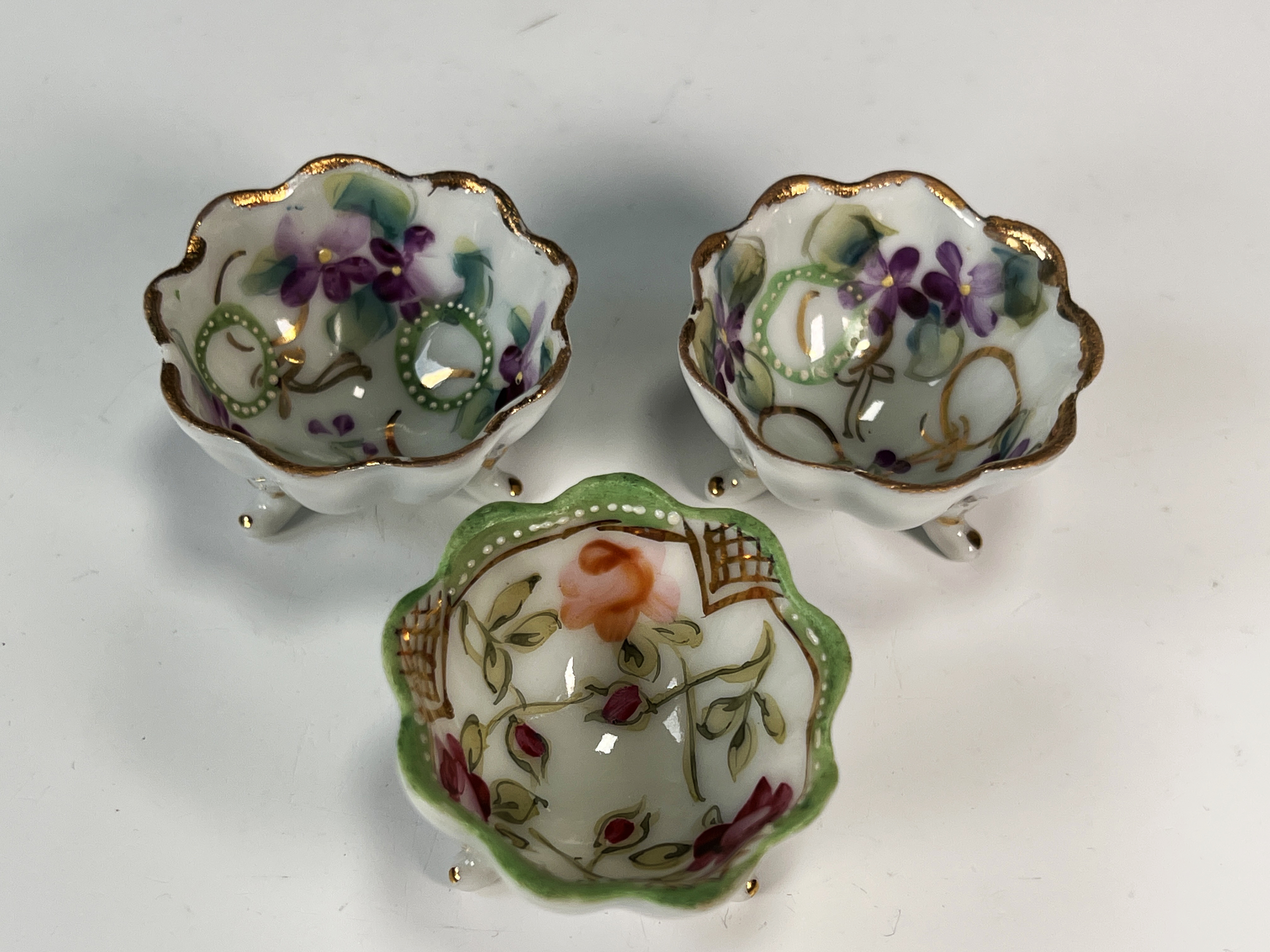 Three Small Tripod Hand Painted Porcelain Salt Cellars image 1